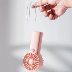 Say goodbye to the heat, Mini Pocket Fan – Portable, Adjustable & Super Cute!