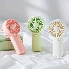 Say goodbye to the heat, Mini Pocket Fan – Portable, Adjustable & Super Cute!