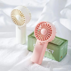 Say goodbye to the heat, Mini Pocket Fan – Portable, Adjustable & Super Cute!