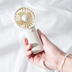 Say goodbye to the heat, Mini Pocket Fan – Portable, Adjustable & Super Cute!