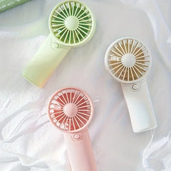 Say goodbye to the heat, Mini Pocket Fan – Portable, Adjustable & Super Cute!